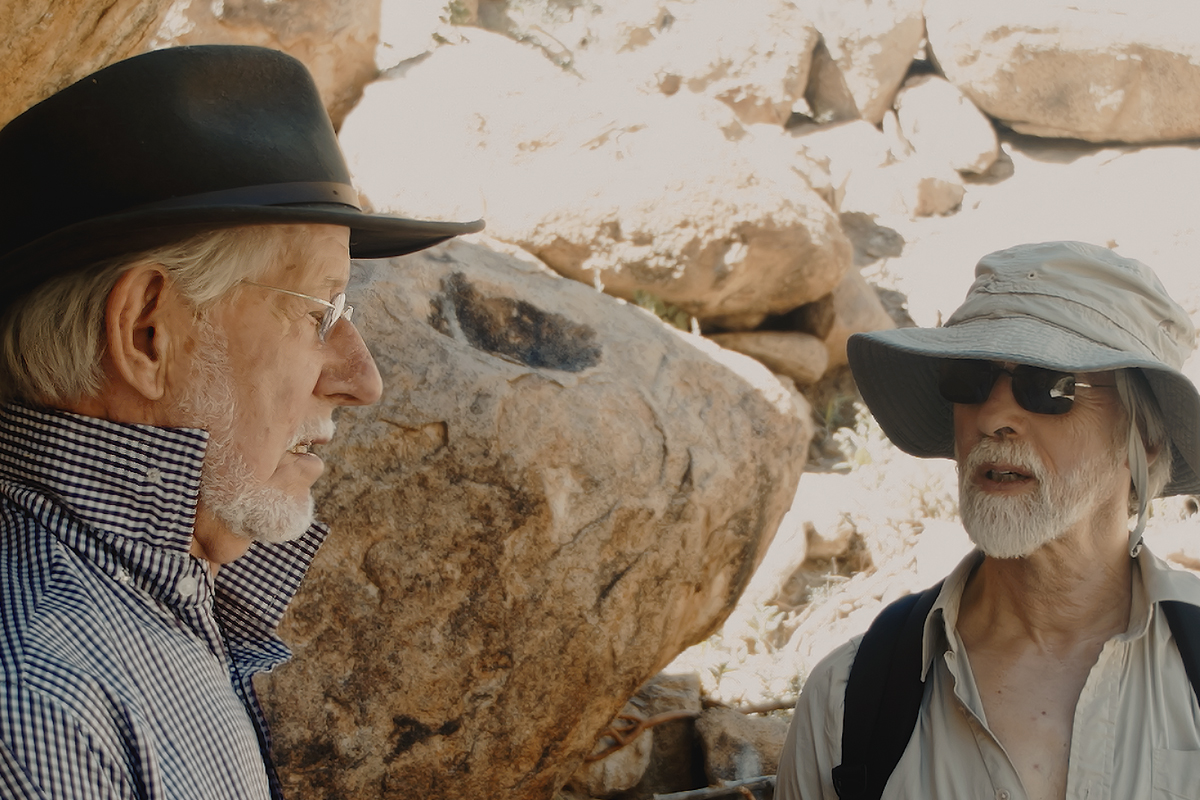 Knut Helskog and fellow Rock Art Network member Neville Agnew record rock art at one of more than 1,000 shelters in the Brandberg, Namibia